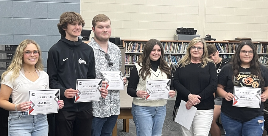 Photo of Madi Donley, Kenton Michael, Luke Reese, Gracie Wolford, Instructor Tammy Roush, and Maxine Carter
